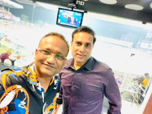 dr sathya menon with indian cricketer vvs laxman at ipl 2022